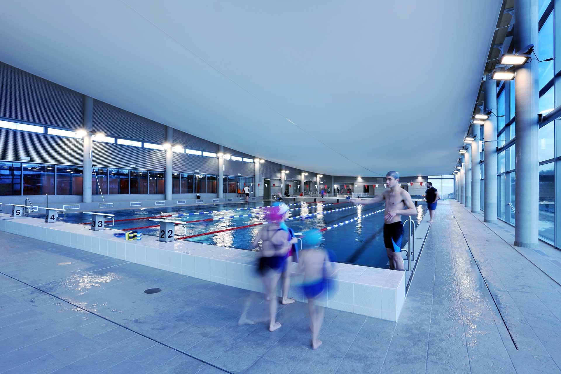 Schréder sports lighting solution cuts energy costs by 67% for Ans swimming pool